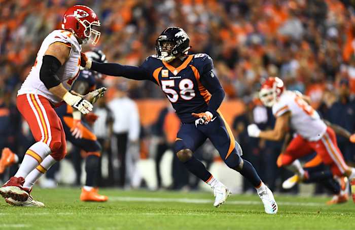 Oct 1, 2018; Denver, CO, USA; Kansas City Chiefs offensive tackle Mitchell Schwartz (71) pass blocks against Denver Broncos linebacker Von Miller (58) in the third quarter against the at Broncos Stadium at Mile High.